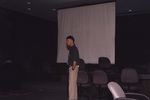 Todd Engstrom stands in front of a projector screen during a Florida Ornithological Society meeting in Tallahassee, Florida
