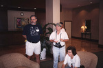 Dave Goodwin, Doug Wassmer, and Cillian Saul lounge in the lobby of the DoubleTree Hotel in Tallahassee, Florida