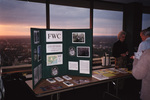 An information table hosts a posterboard and brochures advertising the Florida Fish & Wildlife Conservation Commission