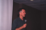 Todd Engstrom faces the audience mid-speech while presenting at a Florida Ornithological Society meeting in Tallahassee, Florida