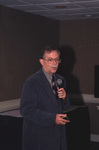 Jerry Jackson holds a slideshow remote mid-speech while presenting at a Florida Ornithological Society meeting in Tallahassee, Florida