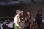 Mary Davidson and Peggy Powell mingle with another guest during a Florida Ornithological Society meeting in Tallahassee, Florida