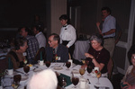 Jerry Jackson smiles mid-conversation at a dinner table during a Florida Ornithological Society meeting in Tallahassee, Florida