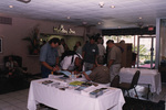 Guests sign forms at a Florida Ornithological Society information table during a meeting in Titusville, Florida