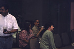 Audience members laugh and discuss during a Florida Ornithological Society meeting in Titusville, Florida