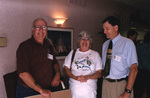 Ed and Marie Slaney smile with Dr. Ross Hinkle at a Florida Ornithological Society meeting