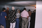John Douglas and other guests view photos from the fall 1999 Florida Ornithological Society meeting