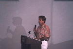 Bruce Anderson holds a microphone mid-speech during a Florida Ornithological Society meeting in Titusville, Florida