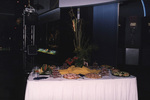 A snack table sits with a large floral centerpiece at a Florida Ornithological Society meeting in Titusville, Florida