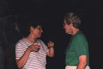 A guest points toward the camera mid-conversation at a Florida Ornithological Society meeting in Titusville, Florida by Florida Ornithological Society