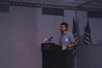 Eric Stolen smiles mid-presentation at a Florida Ornithological Society meeting in Titusville, Florida