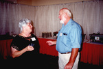 Marie Slaney speaks with John Douglas during a Florida Ornithological Society meeting in Fort Pierce, Florida