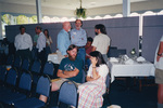 Ted Below, Peter Merritt, and Eugene Stoccardo stand chatting in Fort Pierce, Florida by Florida Ornithological Society