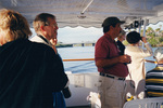Guests view the scenery with binoculars in hand during a boat tour in Fort Pierce, Florida by Florida Ornithological Society