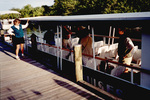 Guests board a water bus for a boat tour in Fort Pierce, Florida