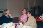 Fred Lohrer chats with two colleagues in Fort Pierce, Florida