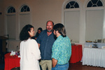Wes Biggs and Eugene Stoccardo speak with another guest in Fort Pierce, Florida