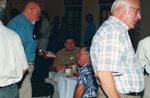 Ted Below speaks with seated guests at a Florida Ornithological Society meeting in Fort Pierce, Florida