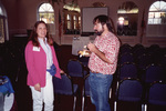 Victoria Merritt smiles while speaking with Eugene Stoccardo in Fort Pierce, Florida