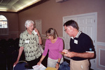 Jane Brooks, Billi Wagner, and Dennis Gates discuss a map in Fort Pierce, Florida by Florida Ornithological Society
