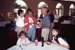 Linda Douglas and Bob Brown speak beside Katy NeSmith in Fort Pierce, Florida