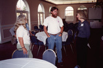 Judy Bryan and Camille Sewell speak with a colleague in Fort Pierce, Florida