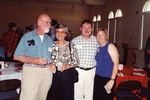 Ted and Ginnie Below pose for a photo with two others in Fort Pierce, Florida
