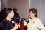 Linda Douglas speaks with a colleague at a Florida Ornithological Society meeting in Fort Pierce, Florida