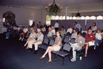 The audience listens and reads during a Florida Ornithological Society meeting in Fort Pierce, Florida