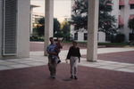 Todd Engstrom Smiles Happily While Holding Child Outside of Old Florida Capitol Building in Tallahassee by Florida Ornithological Society