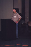 Todd Angshar Stands at Podium During Florida Ornithological Society Meeting in Tallahassee by Florida Ornithological Society