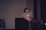 Todd Angshar Looks Away from Audience While Speaking at Florida Ornithological Society Meeting in Tallahassee by Florida Ornithological Society