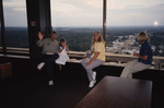 Judy Bryan Sits on Windowsill with Other Guests During Florida Ornithological Society Meeting in Tallahassee by Florida Ornithological Society