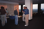 Guests Mingle and Serve Snacks During Florida Ornithological Society Meeting in Tallahassee by Florida Ornithological Society