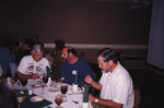 Dave Goodwin and Wes Biggs Dine at Round Banquet Table During Florida Ornithological Society Meeting in Tallahassee by Florida Ornithological Society