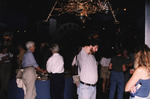 Guests Mingle with Drinks in Large Room of National Aeronautics and Space Administration (NASA) Memorabilia in Titusville by Florida Ornithological Society