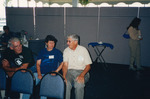 Three Seated Guests Chat at Florida Ornithological Society Meeting in Fort Pierce by Florida Ornithological Society