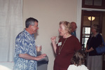 Two Guests Chat Animatedly During Florida Ornithological Society Meeting in Fort Pierce by Florida Ornithological Society