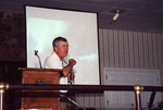 Sonny Bass Gestures to Photo Mid-Presentation in Fort Pierce by Florida Ornithological Society