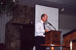 Dr. Paul Gray Gestures Mid-Presentation in Fort Pierce by Florida Ornithological Society