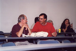 Fred Lohrer Chats Engagedly with Guest Beside Him During Presentation in Fort Myers by Florida Ornithological Society