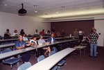 Audience Waits Patiently During Florida Ornithological Society Meeting at Whitaker Hall in Fort Myers by Florida Ornithological Society