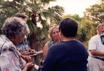 Ann Paul Smiles While Listening to Another Guest in St. Petersburg by Florida Ornithological Society