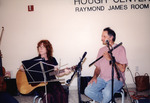 Jim Cox Holds Flute Beside Ensemble Member with Guitar in St. Petersburg by Florida Ornithological Society