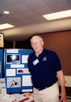 Glen Woolfenden Stands in Front of Posterboard About Least Terns in St. Petersburg by Florida Ornithological Society