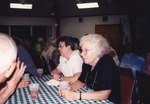 Brenda Rhodes and Pat Anderson Listen from Across Table in Marathon, Florida by Florida Ornithological Society