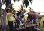 David Stock, David Simpson, Ken Knapp, Grace Stock, and Jack Hailman Crowd Around Picnic Bench in Marathon, Florida by Florida Ornithological Society