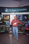 Buck Cooper Stands in Front of Large Exhibit on U.S. Sugar Corporation in Clewiston by Florida Ornithological Society