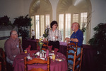 Glen and Jan Woolfenden Chat with Buck Cooper in Clewiston Inn Dining Room in Clewiston by Florida Ornithological Society