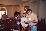 Judith Buhrman, Karen Albritton, and Ken Spilias Consult Clipboard During Meeting in Clewiston by Florida Ornithological Society